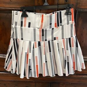 High waisted tennis skirt size small -white w/orange and black vertical stripes
